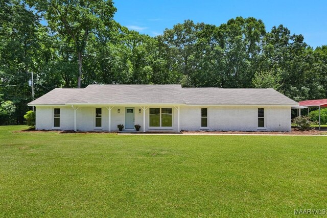 5010 Redland Rd, Wetumpka, AL 36093 - view of front of house featuring a front lawn, brick siding, and a porch