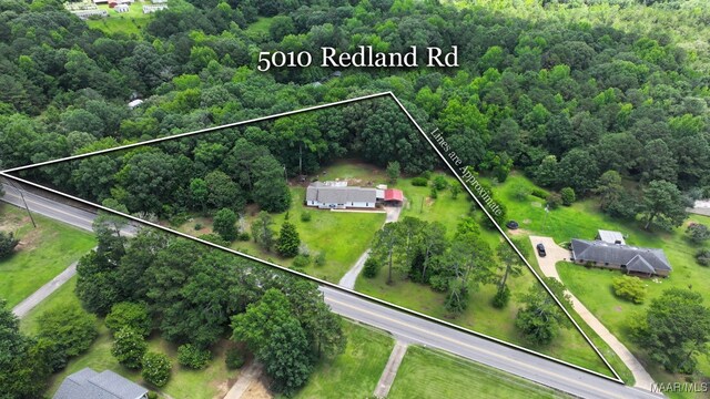 5010 Redland Rd, Wetumpka, AL 36093 - aerial overview of property's location featuring property boundaries highlighted and a forest