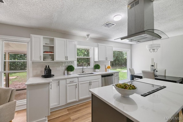 5010 Redland Rd, Wetumpka, AL 36093 - kitchen with island range hood, stainless steel dishwasher, a textured ceiling, white cabinetry, and open shelves