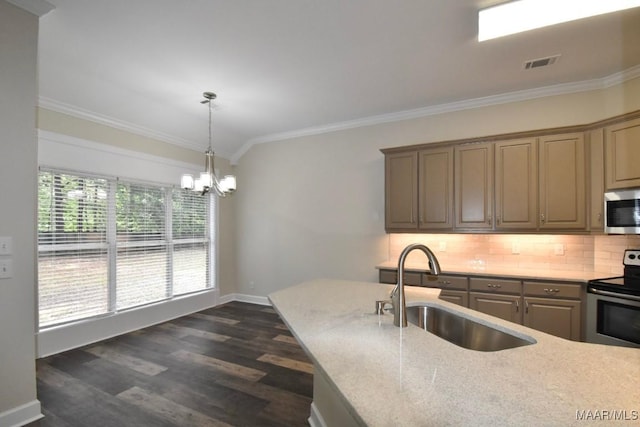 831 Windsong Loop, Wetumpka, AL 36093 - kitchen featuring appliances with stainless steel finishes, ornamental molding, backsplash, a chandelier, and dark wood finished floors
