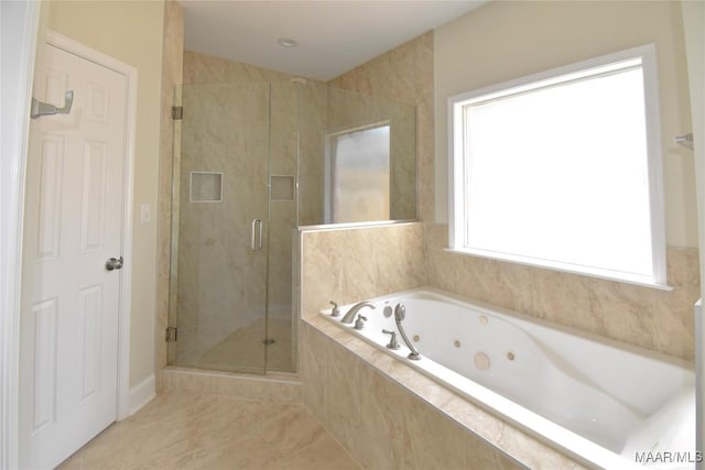 831 Windsong Loop, Wetumpka, AL 36093 - full bathroom with a tub with jets, a shower stall, and tile patterned flooring
