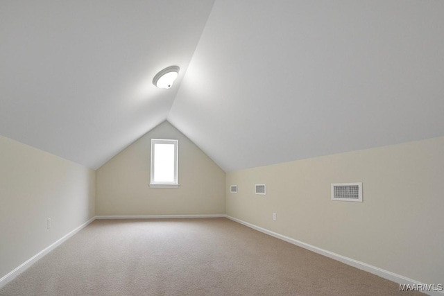 831 Windsong Loop, Wetumpka, AL 36093 - additional living space featuring lofted ceiling and carpet