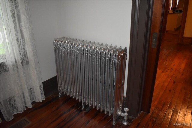 2207 Winona Ave, Montgomery, AL 36107 - detailed view of radiator and wood finished floors