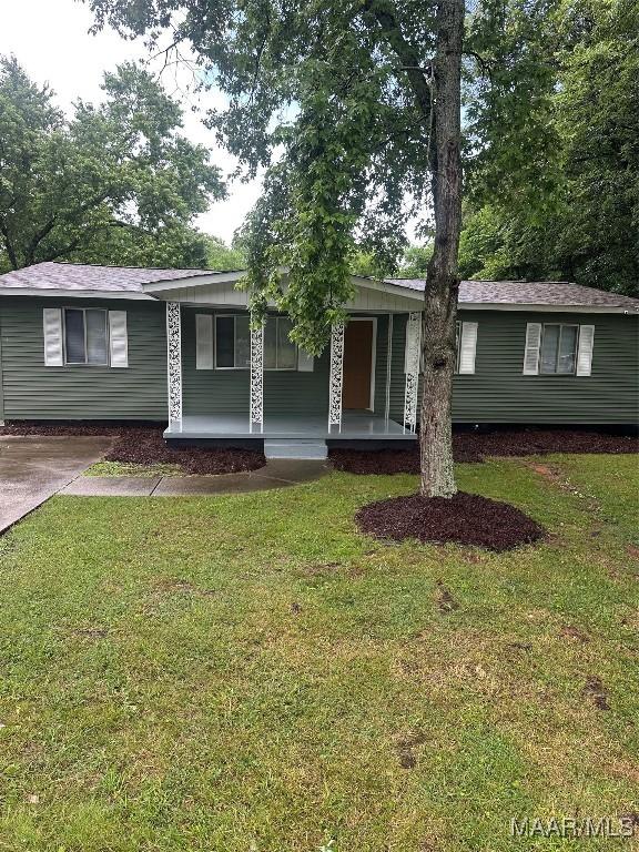 705 Mastin Lake Rd NW, Huntsville, AL 35811 - view of front of property with a porch and a front lawn