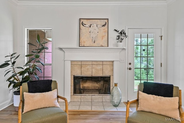 25 Sandy Springs Dr, Wetumpka, AL 36092 - sitting room featuring ornamental molding, a tile fireplace, and wood finished floors