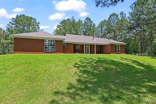 25 Sandy Springs Dr, Wetumpka, AL 36092 - rear view of property with a lawn