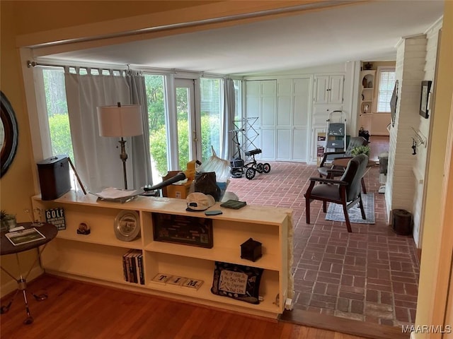119 Mallory Dr, Selma, AL 36701 - dining room with healthy amount of natural light and brick patterned floors