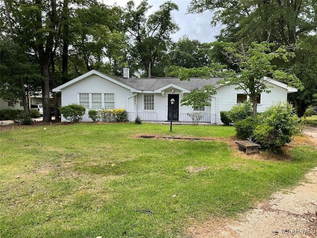 119 Mallory Dr, Selma, AL 36701 - ranch-style house featuring a front yard and roof with shingles