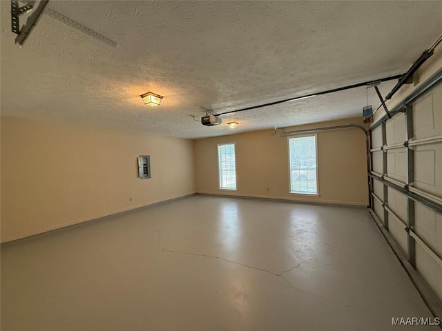 7415 Brampton Ln, Montgomery, AL 36117 - garage with a garage door opener and electric panel
