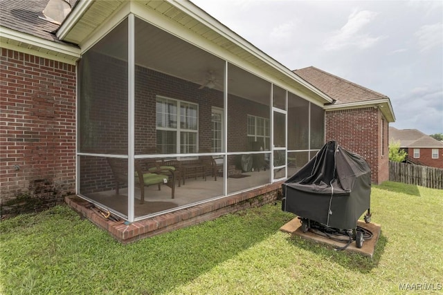 109 Inverness Rd, Wetumpka, AL 36092 - view of side of home with a sunroom, brick siding, and ceiling fan
