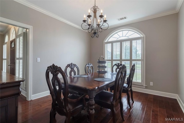 109 Inverness Rd, Wetumpka, AL 36092 - dining area featuring a chandelier, crown molding, and dark wood-type flooring
