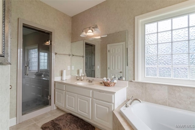 109 Inverness Rd, Wetumpka, AL 36092 - full bath featuring a bath, vanity, tile patterned flooring, and a shower stall