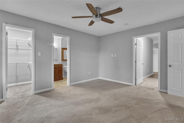 113 Duck Cv, Elmore, AL 36025 - unfurnished bedroom with a spacious closet, light colored carpet, a closet, and ensuite bath
