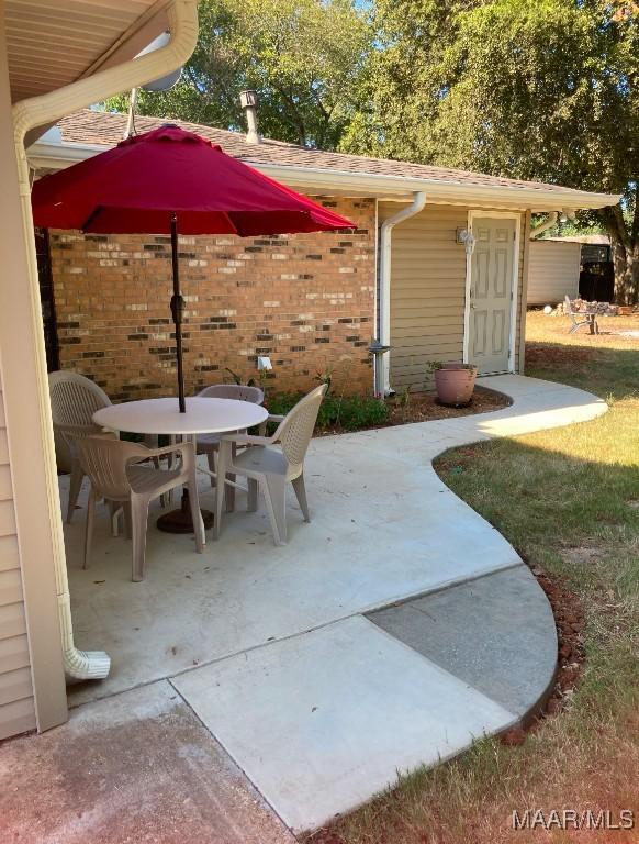 113 Duck Cv, Elmore, AL 36025 - view of patio featuring outdoor dining space