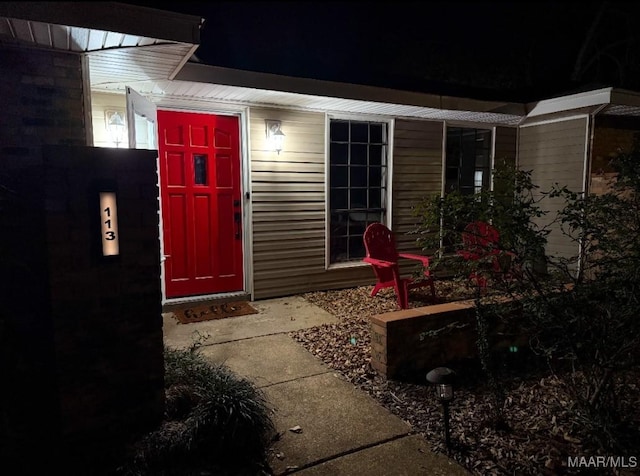 113 Duck Cv, Elmore, AL 36025 - view of exterior entry at twilight