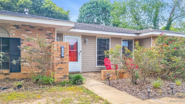 113 Duck Cv, Elmore, AL 36025 - entrance to property with brick siding and a shingled roof