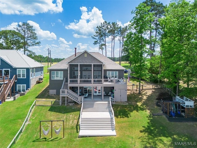 529 Hickory Dr, Wetumpka, AL 36092 - rear view of property with stairs, a sunroom, a deck, a shingled roof, and a fenced backyard