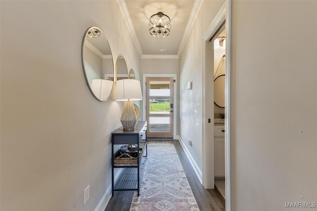 529 Hickory Dr, Wetumpka, AL 36092 - entryway with a chandelier, crown molding, and wood finished floors