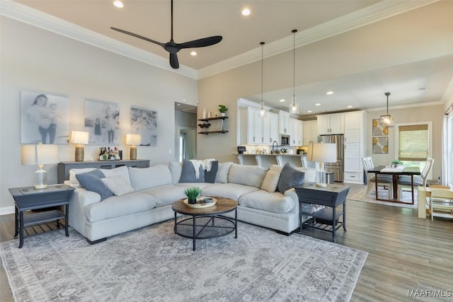529 Hickory Dr, Wetumpka, AL 36092 - living area with wood finished floors, crown molding, a ceiling fan, and recessed lighting