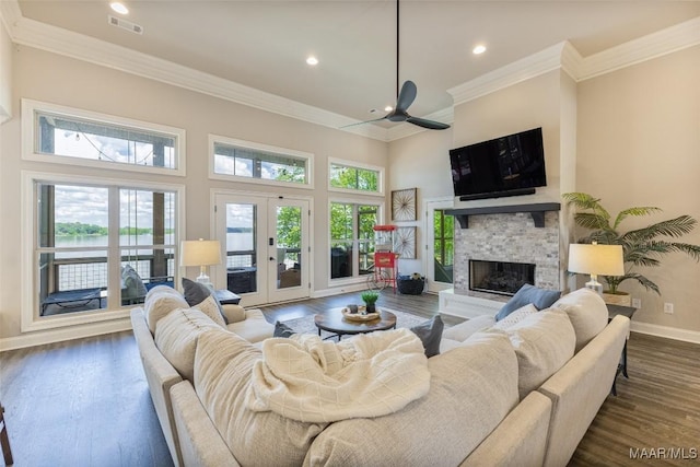 529 Hickory Dr, Wetumpka, AL 36092 - living room featuring crown molding, a fireplace, recessed lighting, dark wood-style floors, and french doors