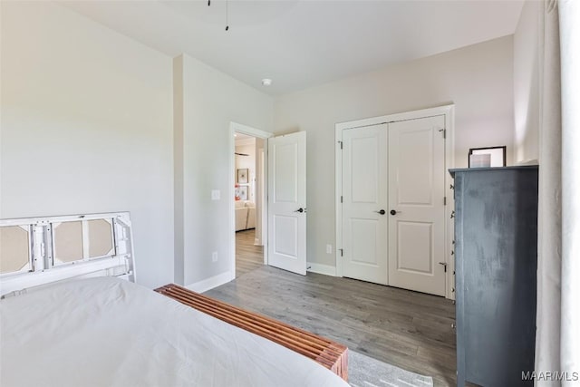 529 Hickory Dr, Wetumpka, AL 36092 - unfurnished bedroom featuring wood finished floors and a closet