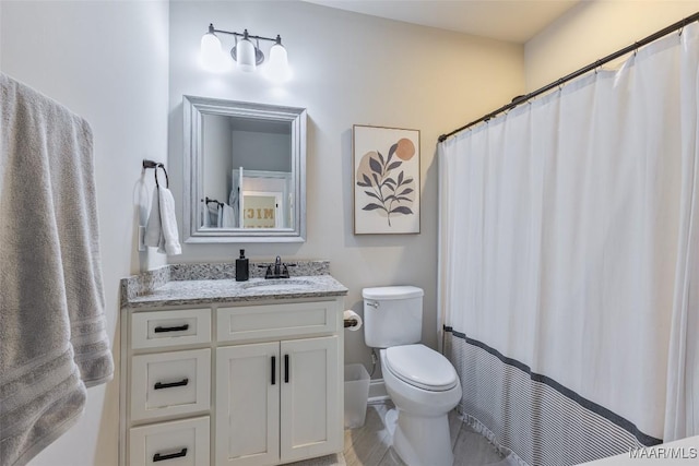 529 Hickory Dr, Wetumpka, AL 36092 - bathroom featuring toilet and vanity