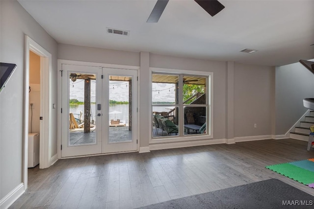 529 Hickory Dr, Wetumpka, AL 36092 - entryway with ceiling fan, stairs, french doors, and wood finished floors