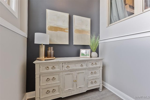529 Hickory Dr, Wetumpka, AL 36092 - detailed view of baseboards and wood finished floors