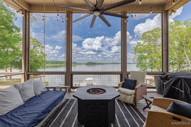 529 Hickory Dr, Wetumpka, AL 36092 - sunroom with a water view, an outdoor living space with a fire pit, and a ceiling fan