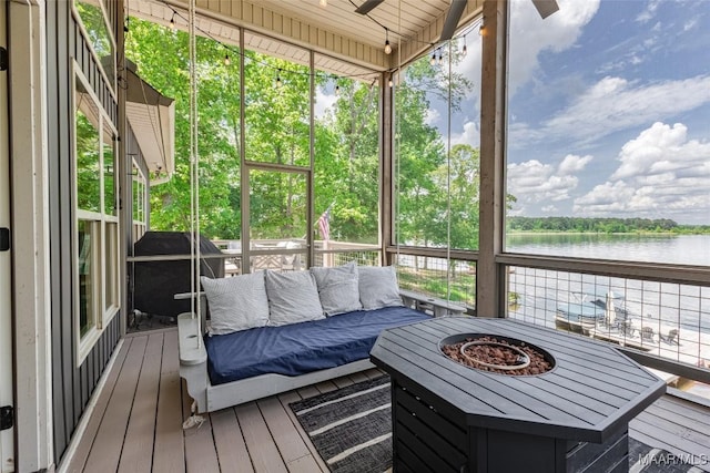 529 Hickory Dr, Wetumpka, AL 36092 - sunroom / solarium with a water view, an outdoor living space with a fire pit, and a ceiling fan
