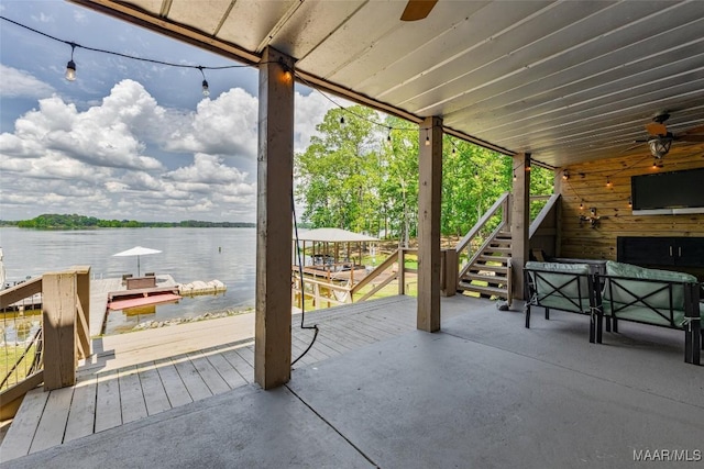 529 Hickory Dr, Wetumpka, AL 36092 - view of patio / terrace featuring stairway, a ceiling fan, a water view, and a dock