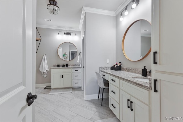 529 Hickory Dr, Wetumpka, AL 36092 - bathroom featuring crown molding and two vanities