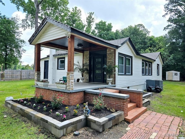4760 Longview Rd, Elmore, AL 36025 - view of front of house with stone siding and covered porch