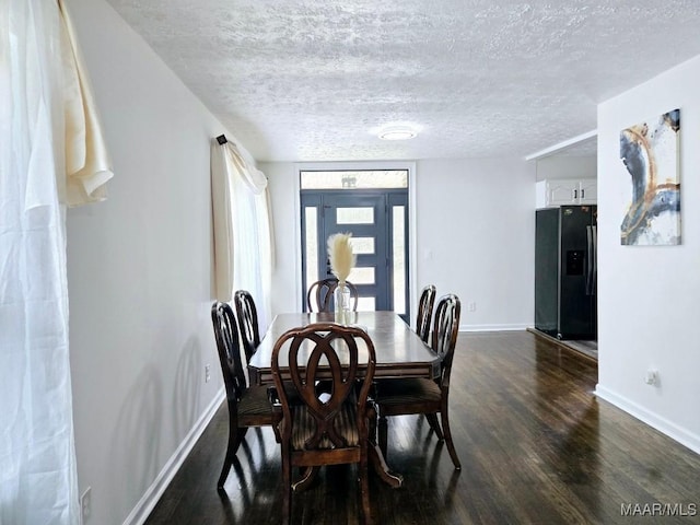 4760 Longview Rd, Elmore, AL 36025 - dining area with dark wood finished floors and a textured ceiling