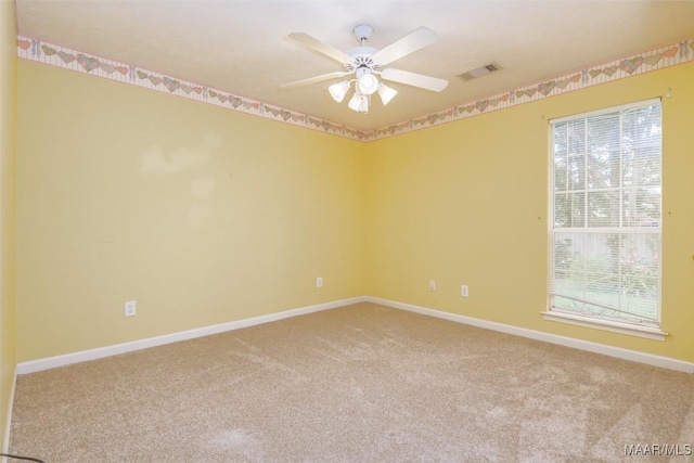 422 River Oaks Dr, Wetumpka, AL 36092 - carpeted empty room with healthy amount of natural light and a ceiling fan