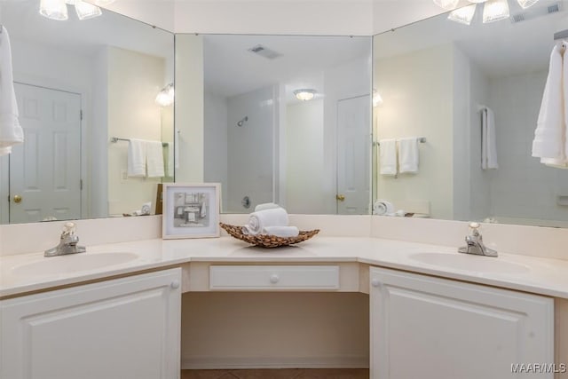422 River Oaks Dr, Wetumpka, AL 36092 - bathroom with double vanity, tile patterned flooring, and a shower