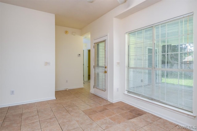 422 River Oaks Dr, Wetumpka, AL 36092 - spare room featuring baseboards and light tile patterned floors
