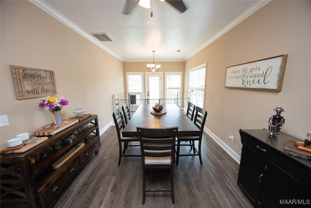 207 Pine Level Rdg, Deatsville, AL 36022 - dining area featuring a ceiling fan, dark wood-type flooring, crown molding, and a chandelier