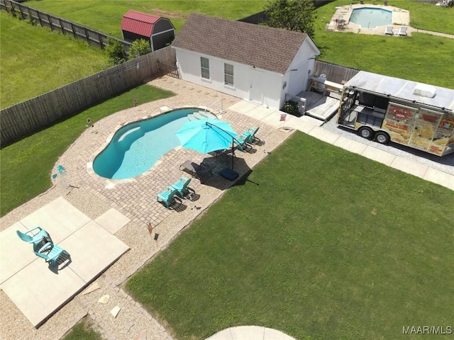 207 Pine Level Rdg, Deatsville, AL 36022 - view of pool featuring a fenced backyard, an outbuilding, and a patio area
