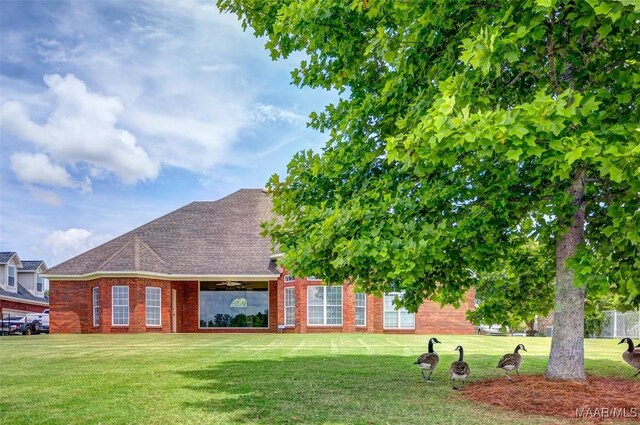 8330 Chadburn Way, Montgomery, AL 36116 - view of front of house featuring a front yard, brick siding, and a shingled roof