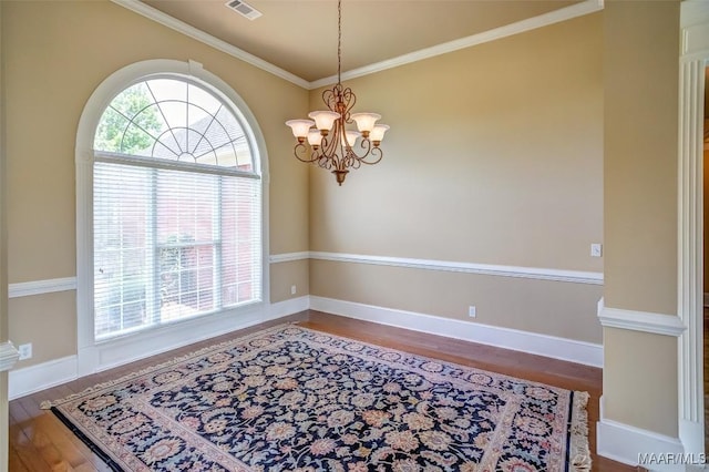 8330 Chadburn Way, Montgomery, AL 36116 - dining room featuring wood finished floors, a chandelier, and crown molding