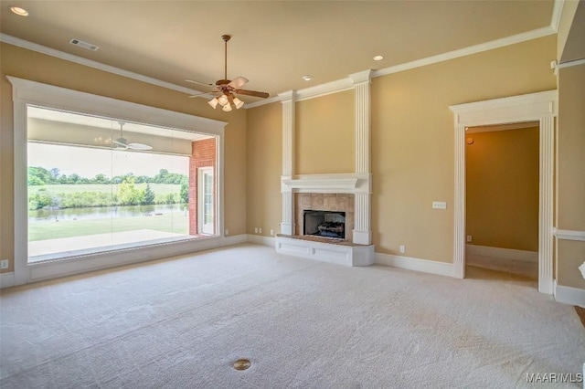 8330 Chadburn Way, Montgomery, AL 36116 - unfurnished living room with ornamental molding, carpet, a ceiling fan, a tiled fireplace, and recessed lighting