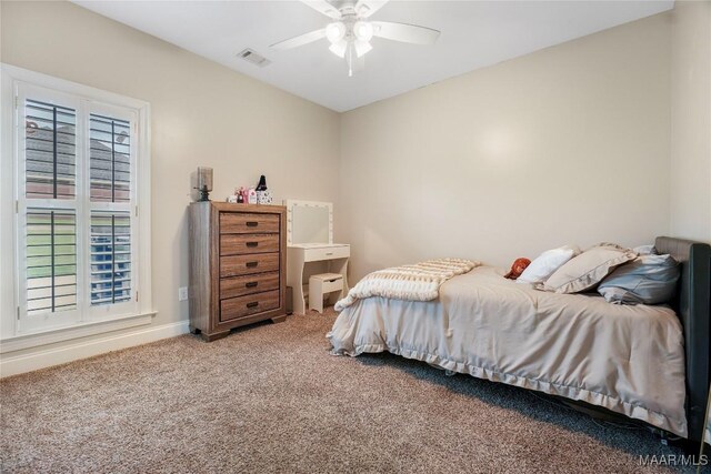 145 Mountain Meadows Ln, Wetumpka, AL 36093 - carpeted bedroom featuring a ceiling fan and baseboards