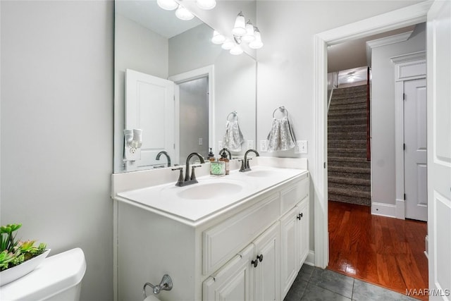 145 Mountain Meadows Ln, Wetumpka, AL 36093 - full bathroom with double vanity and wood finished floors