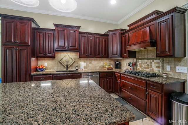 145 Mountain Meadows Ln, Wetumpka, AL 36093 - kitchen with reddish brown cabinets, gas stovetop, custom exhaust hood, dishwasher, and ornamental molding