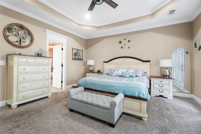 145 Mountain Meadows Ln, Wetumpka, AL 36093 - bedroom featuring a raised ceiling, light carpet, ornamental molding, and ceiling fan