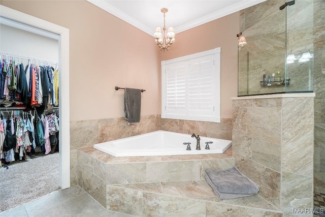 145 Mountain Meadows Ln, Wetumpka, AL 36093 - full bathroom with a garden tub, a tile shower, a chandelier, ornamental molding, and tile patterned flooring