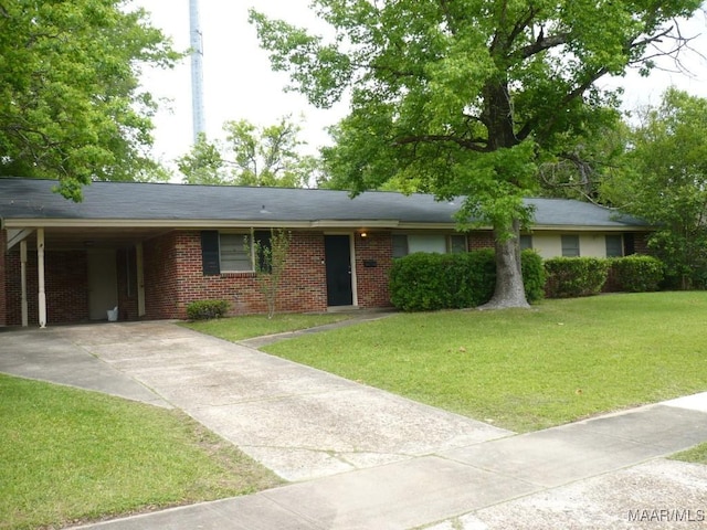3055 N Colonial Dr, Montgomery, AL 36111 - single story home with driveway, brick siding, a front yard, and a carport