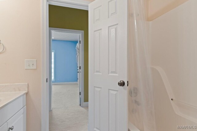 204 St Thomas Ave, Wetumpka, AL 36092 - bathroom with vanity and shower / bathtub combination with curtain