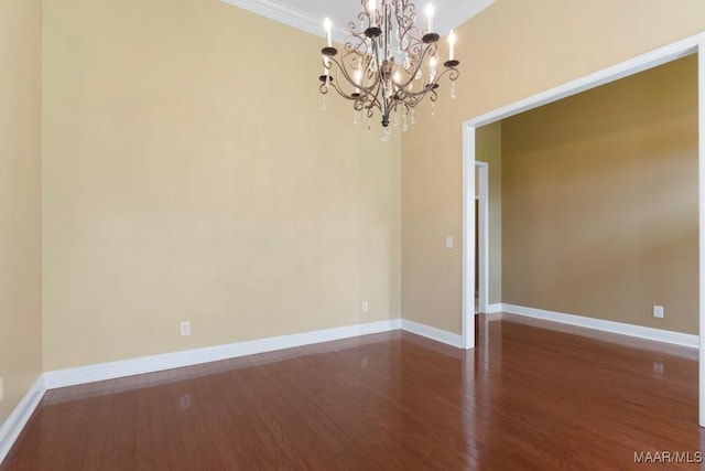 204 St Thomas Ave, Wetumpka, AL 36092 - spare room with a chandelier, wood finished floors, and ornamental molding